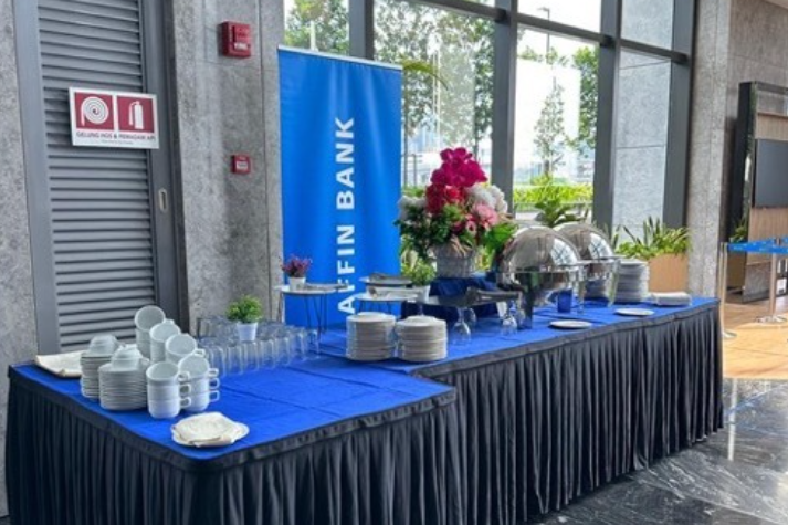 AffinMax Mobile Apps Launching — decorated chairs with blue ribbon bows and AffinMax branding